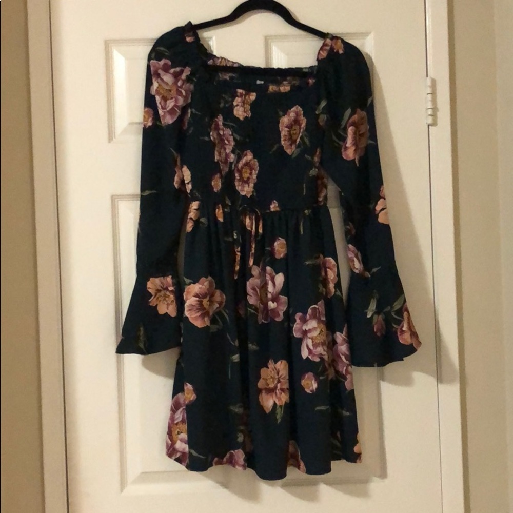 Off the shoulder green floral dress.